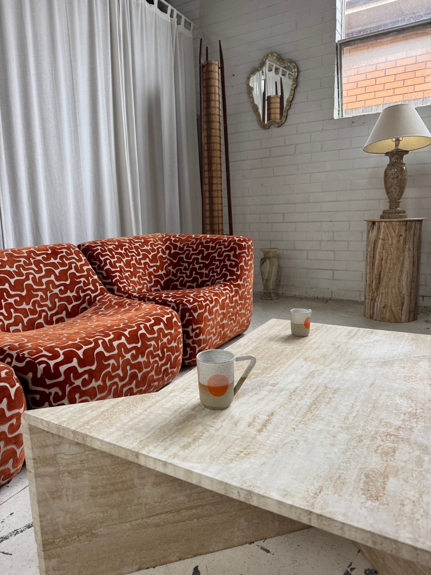 Two Piece Sculptural Travertine Triangle Coffee Tables