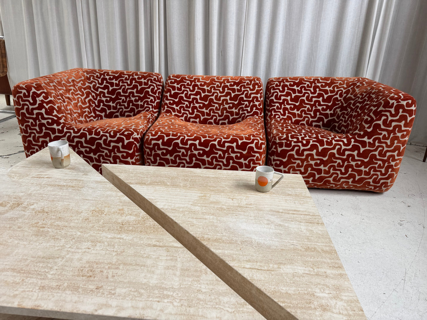 Two Piece Sculptural Travertine Triangle Coffee Tables