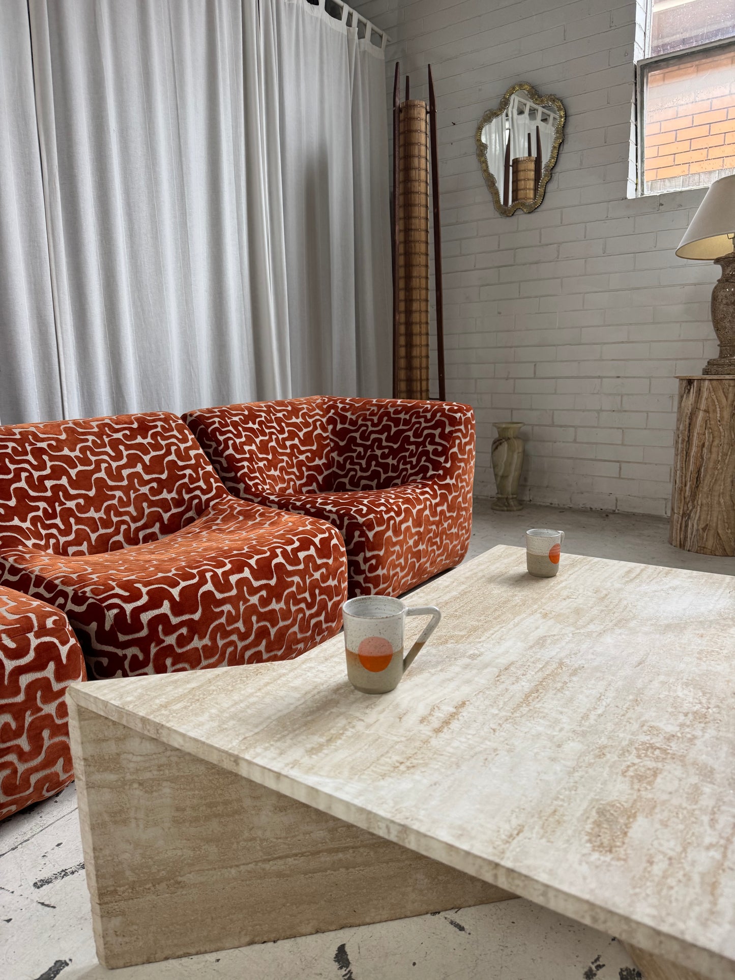 Two Piece Sculptural Travertine Triangle Coffee Tables